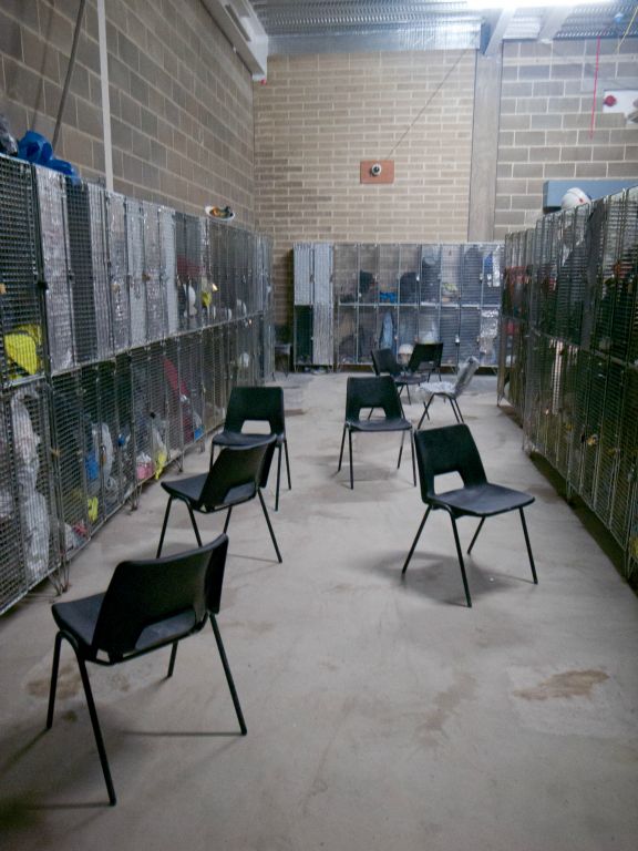 A deserted changing room on a building site in London with surveilance.